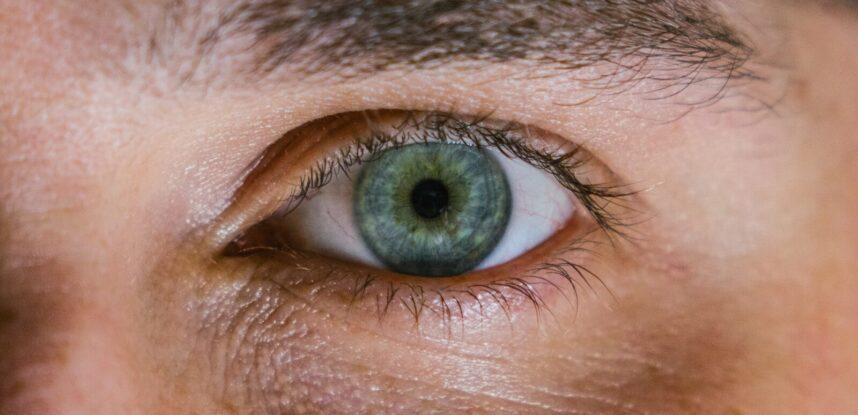 macro shot photography of person's right eye